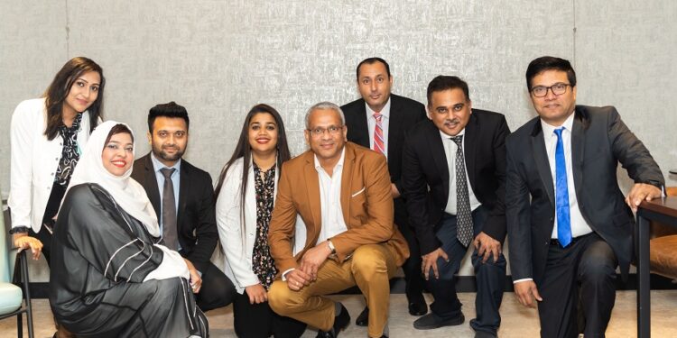 Pradeep Kumar, General Manager, ABCOM Distribution LLC, with Abcom Team
